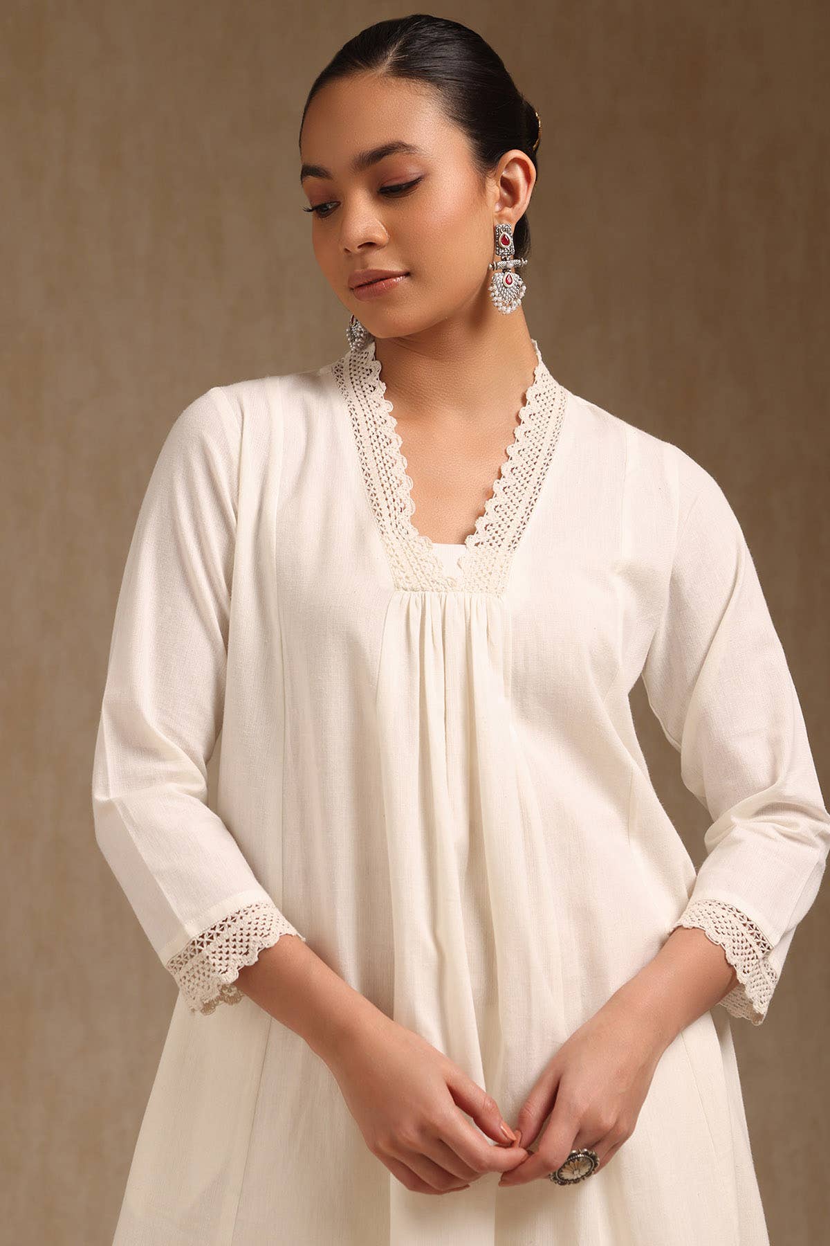 Off White Cotton Solid V-Neck Lace Inserts A-Line Kurta With Front Pleats